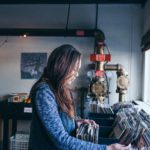Asian woman going through music records